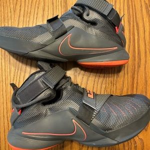Grey and peach Nike LeBron basketball shoes